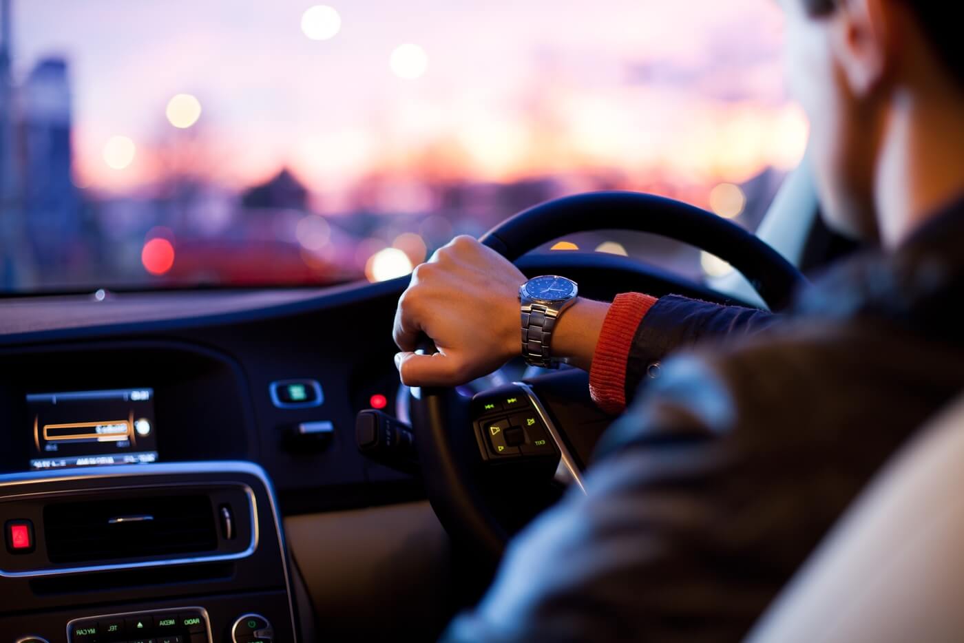 Man driving car at night