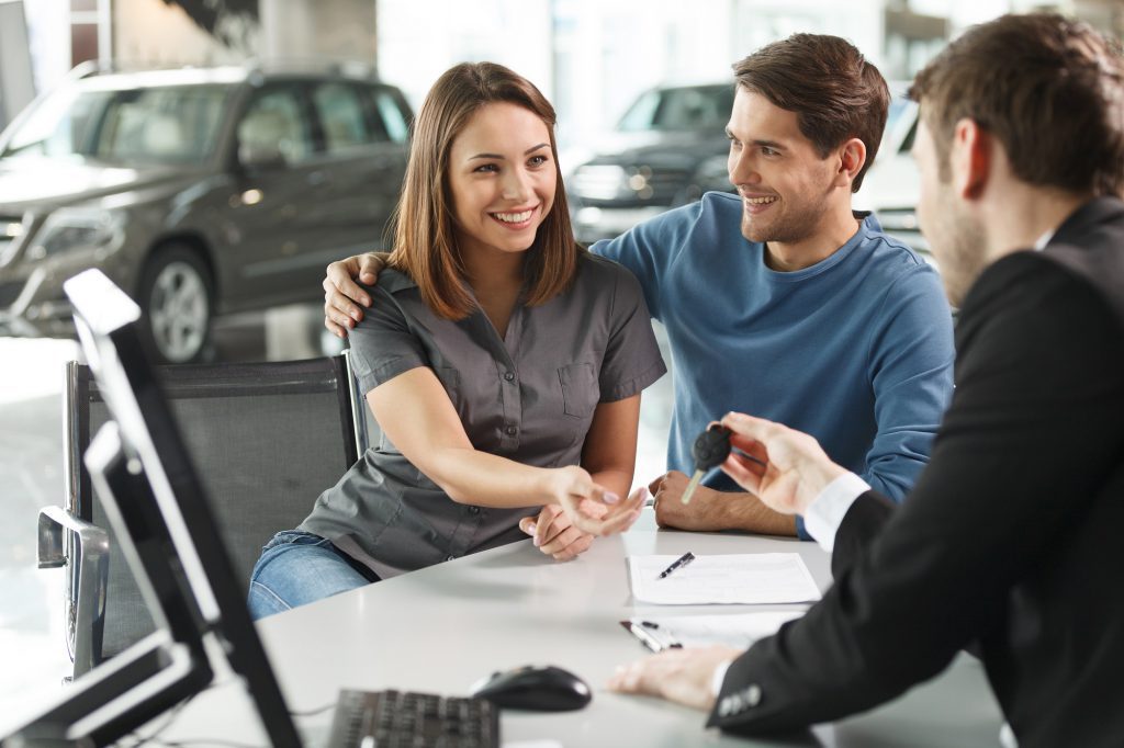 Couple buying a car