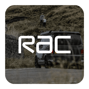 image of motorhome and family walking up hill