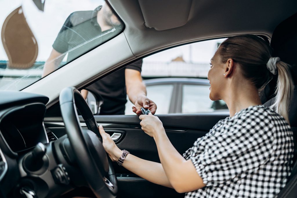 person buying a new car