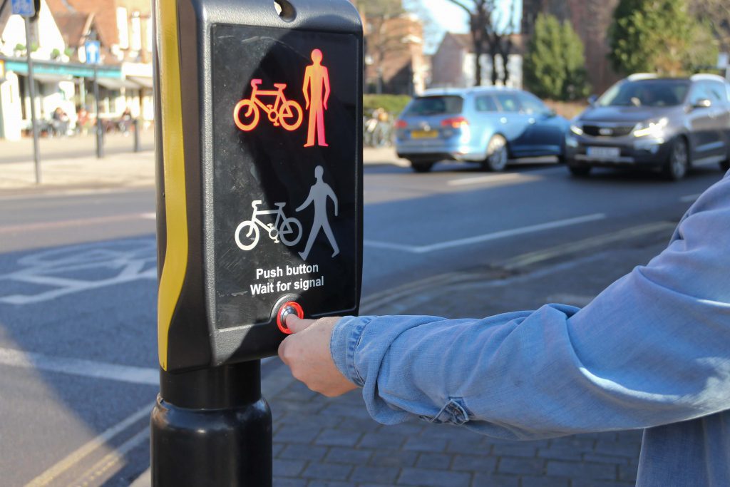 Press button road crossing