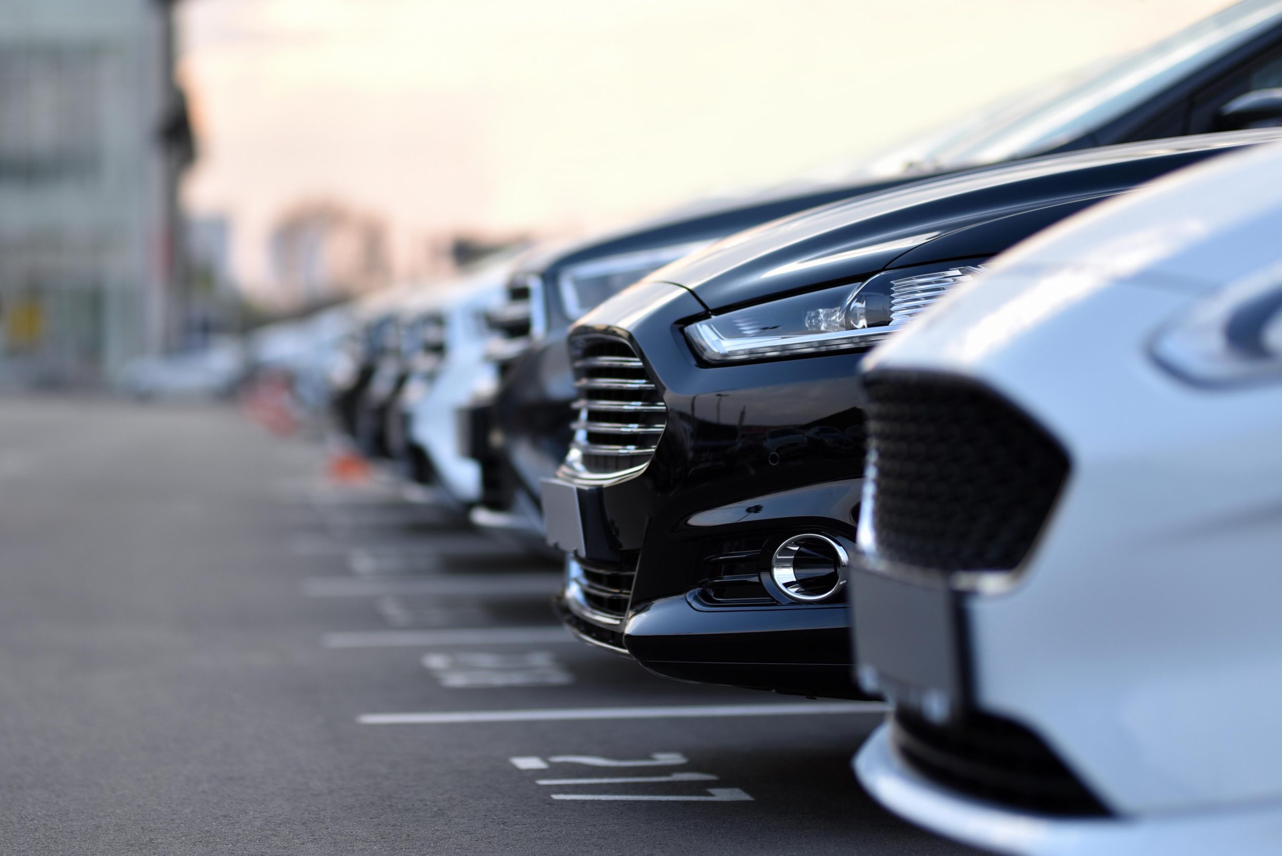 A row of cars parked up